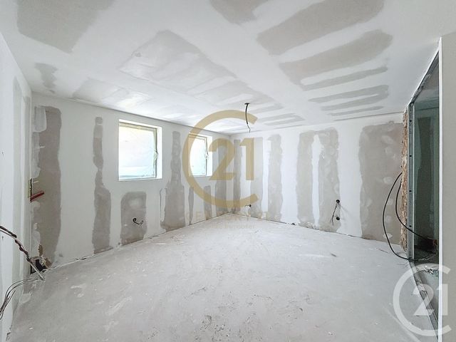 Afficher la photo en grand Appartement à vendre - 4 pièces - 102.52 m2 - ST LAURENT D AGNY - 69 - RHONE-ALPES - Century 21 Identité Immobilier