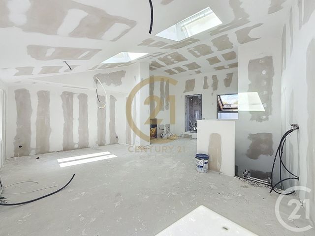 Afficher la photo en grand Appartement à vendre - 4 pièces - 102.52 m2 - ST LAURENT D AGNY - 69 - RHONE-ALPES - Century 21 Identité Immobilier