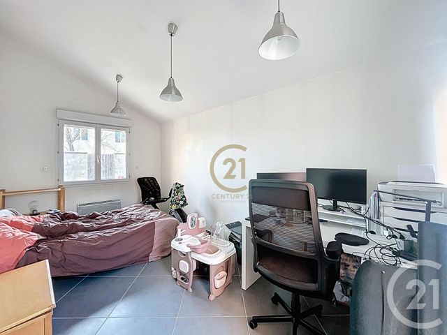 Appartement T3 à louer - 3 pièces - 64.5 m2 - ST GENIS LAVAL - 69 - RHONE-ALPES - Century 21 Identité Immobilier