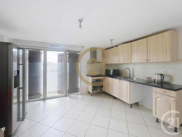 Appartement T4 à louer - 4 pièces - 72.0 m2 - ST GENIS LAVAL - 69 - RHONE-ALPES - Century 21 Identité Immobilier