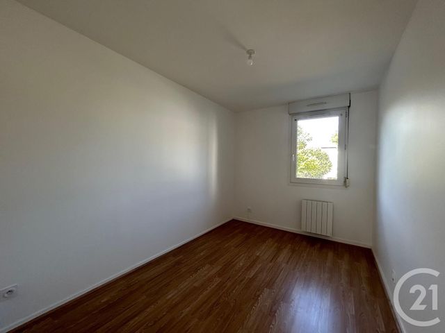 Appartement F3 à louer - 3 pièces - 69.96 m2 - ST GENIS LAVAL - 69 - RHONE-ALPES - Century 21 Identité Immobilier
