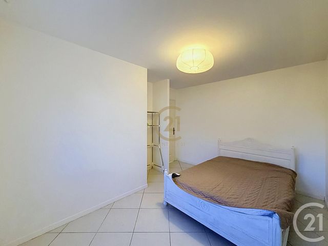 Appartement T3 à louer - 3 pièces - 59.26 m2 - ST GENIS LAVAL - 69 - RHONE-ALPES - Century 21 Identité Immobilier