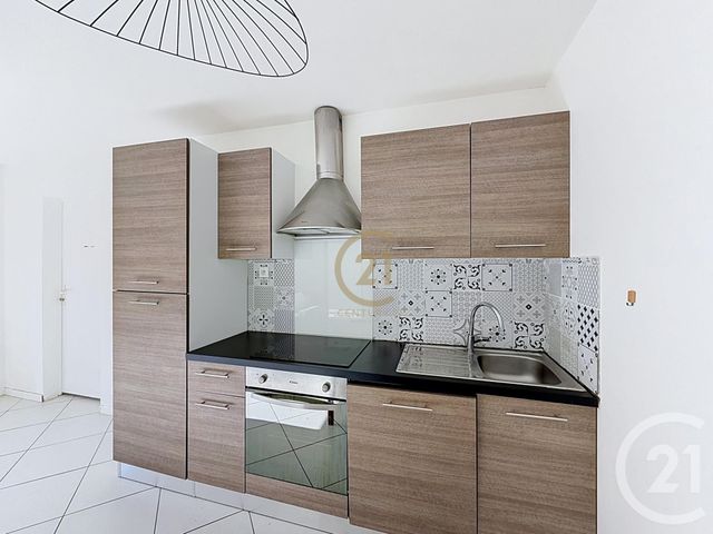Appartement T3 à louer - 3 pièces - 59.26 m2 - ST GENIS LAVAL - 69 - RHONE-ALPES - Century 21 Identité Immobilier